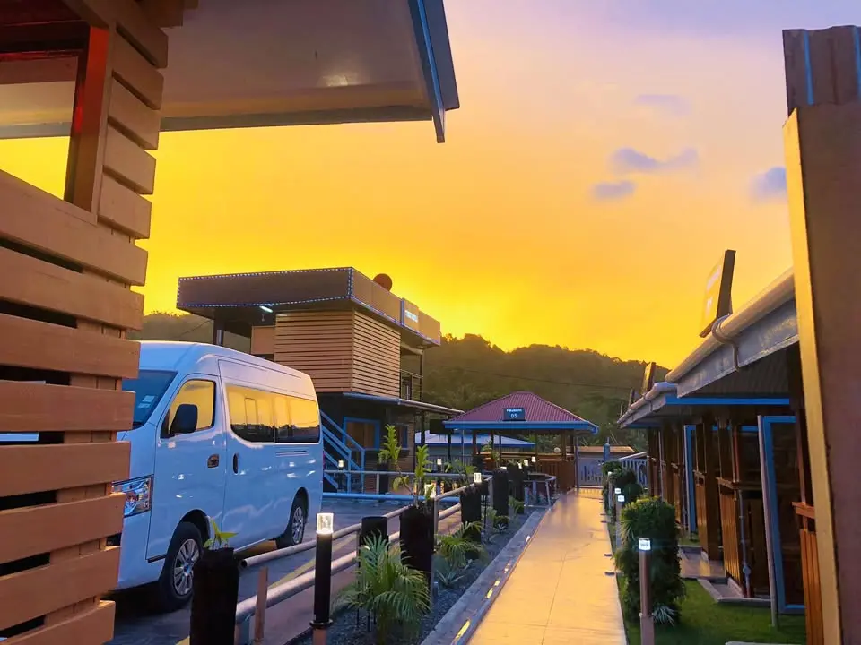 Bovotel accommodation in Arawa glowing at sunset